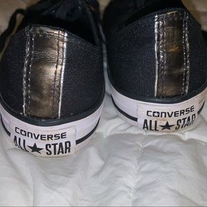 Black and gold Converse